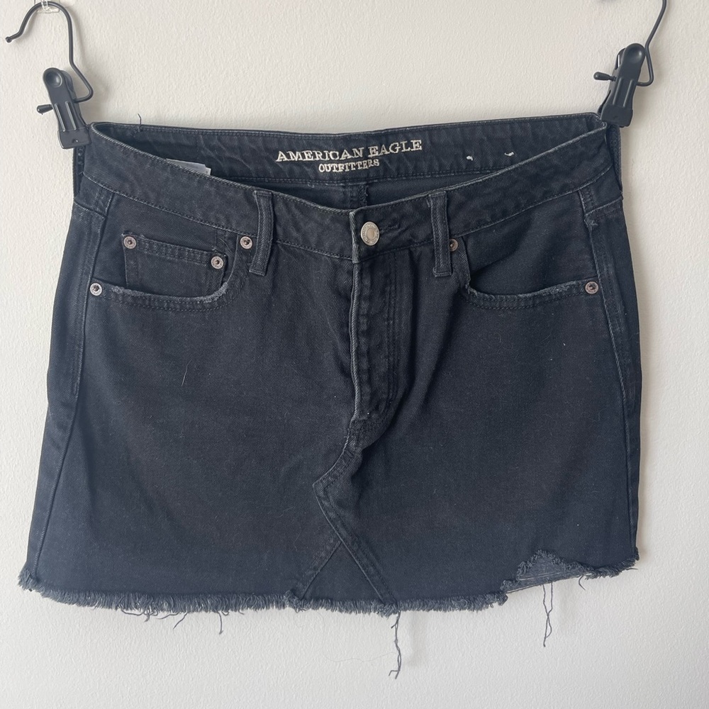 Black denim skirt